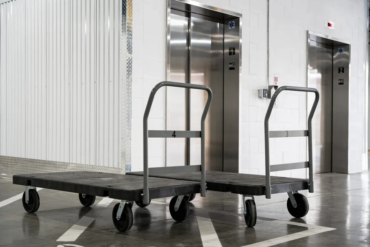 View of dollies at U-Stor-It self storage facility.