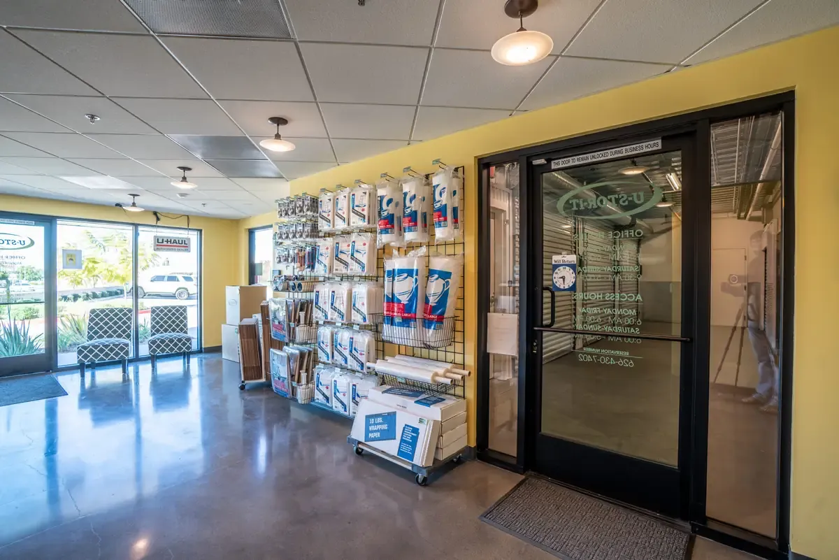 Interior of U-Stor-It facility, view of office and storage supplies.